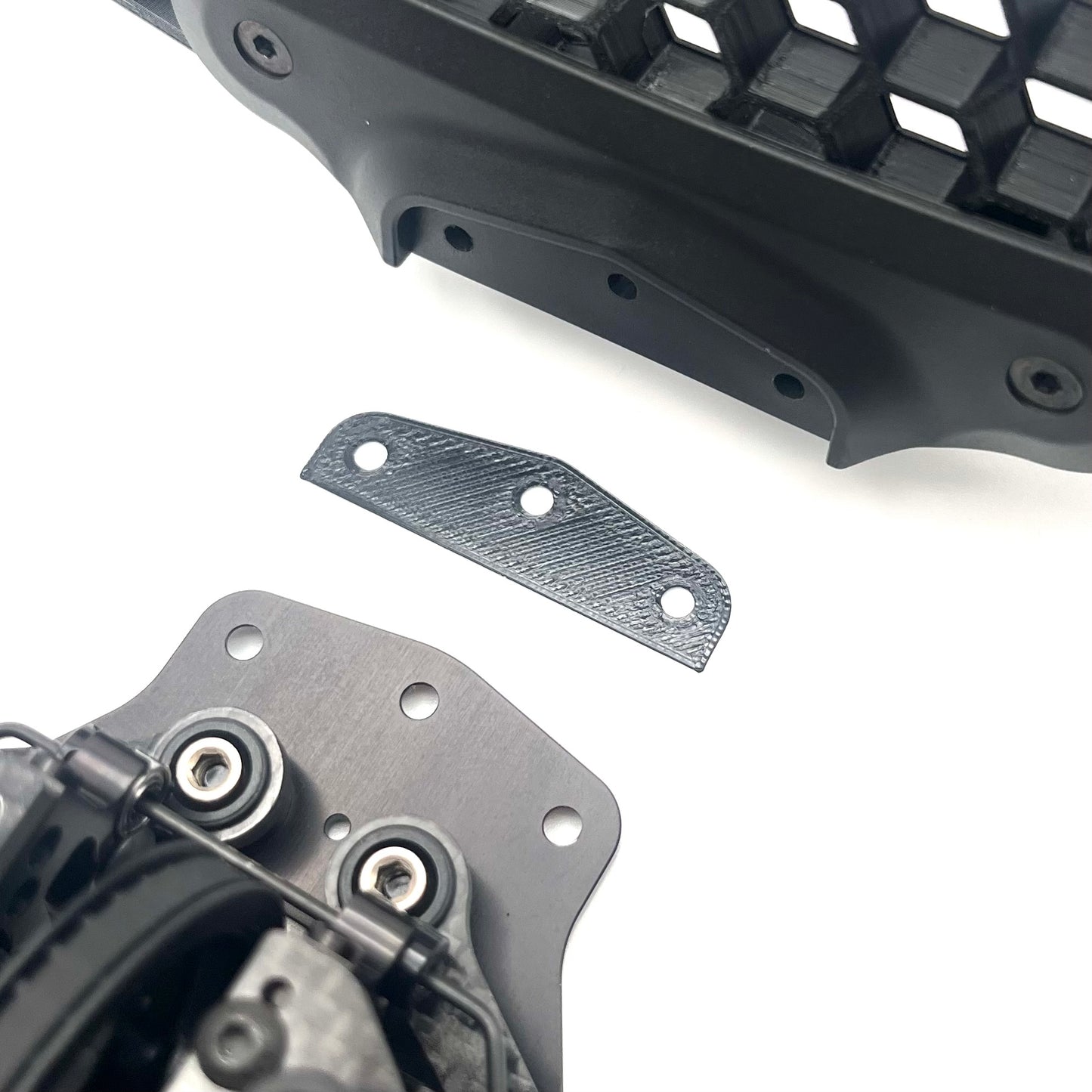 Xray X4/T4 Bumper Shim